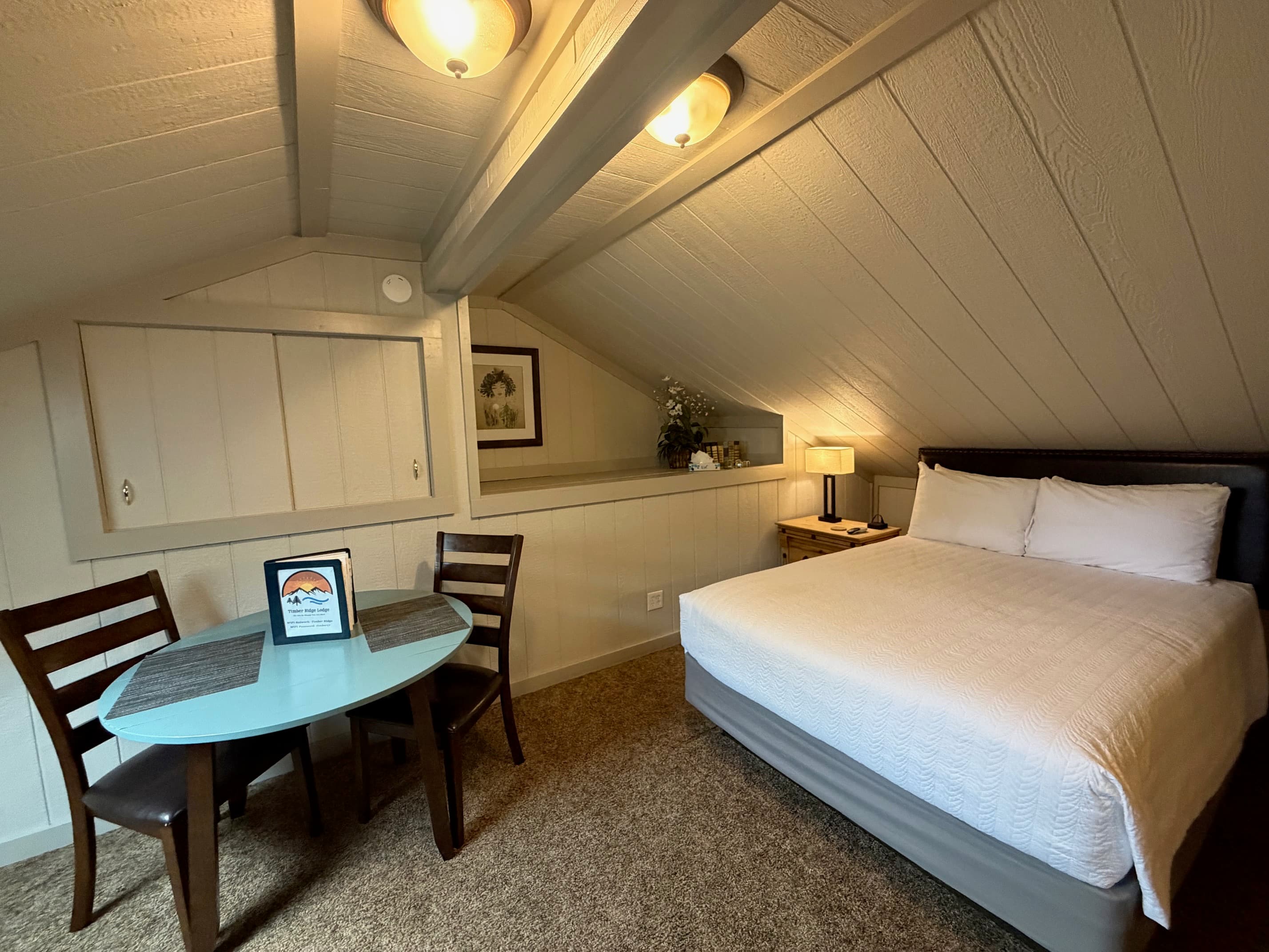 Dining Table seats 2. Two Leather chairs are also provided for reading and relaxation.